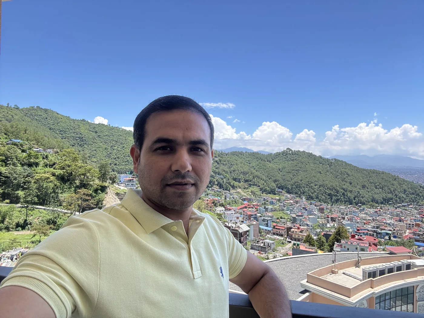 Abhishek Punia overlooking a Nepal hillside town